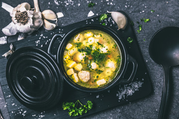 Wall Mural - fresh vegetable soup on the feast day as a top view