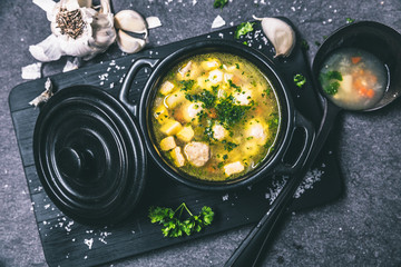 Wall Mural - fresh vegetable soup on the feast day as a top view