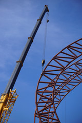 steel roof frame installation by mobile crane