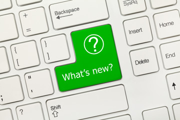 Canvas Print - White conceptual keyboard - What is new (green key)