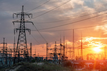 High-voltage Power Lines. Electricity Distribution Station. High Voltage Electric Transmission Tower. Distribution Electric Substation With Power Lines And Transformers