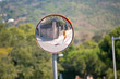 Close up traffic convex mirror, road safety concept