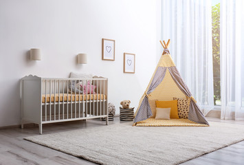 Poster - Cozy baby room interior with play tent and toys