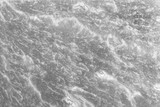 Fototapeta Kwiaty - Gray and white background. Natural stone Slate rough texture