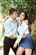 © soleg - young couple walking in the forest, posing near tree, summer nature, bright sunlight, shadows and green leaves, romantic feelings