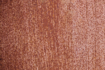  The texture of a striped red rusty iron sheet, background