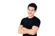 © Atstock Productions - Smiling young Asian man in casual black t-shirt with arm crossed
