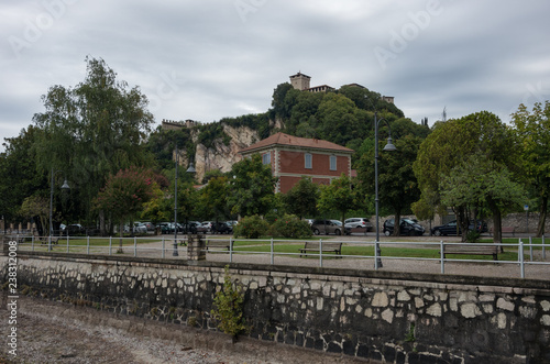 Fotografie, Obraz Rocca di Angera castle, view out off Angera town's embankment of lake Maggiore,