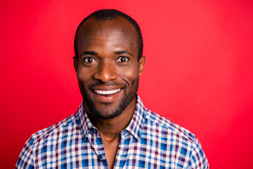 Wall Mural - Close-up portrait of nice handsome attractive cheerful cheery optimistic guy wearing checked shirt isolated over bright vivid red background