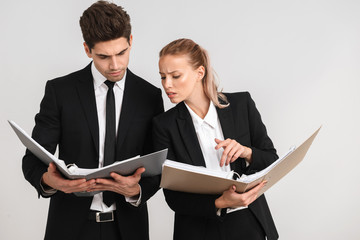 Wall Mural - Confident young business couple standing