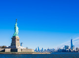 Fototapeta Koty - ニューヨーク　自由の女神とマンハッタンの摩天楼