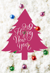 Wall Mural - top view of colorful christmas toys on white cotton wool background with 