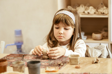 Wall Mural - children's hands sculpts