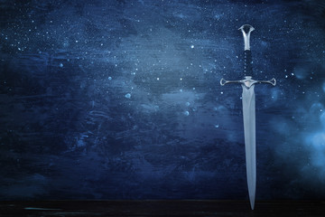 low key banner of silver sword. fantasy medieval period.