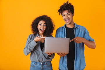 Sticker - Cheerful young african couple standing