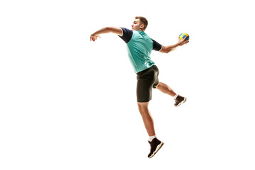 The fit caucasian young male handball player at studio on white background. Fit athlete isolated on white. The man in action, motion, movement. attack and defense concept