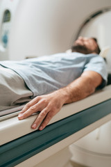 Wall Mural - Patient Lying on the CT Scanner Bed