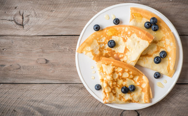 Canvas Print - Crepes with blueberries and honey