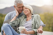 Loving portrait of modern senior couple outdoors