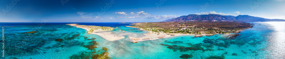 Aerial view of Elafonissi beach on Crete island with azure clear water, Greece, Europeof Elafonissi beach on Crete island with azure clear water, Greece, Europe - obrazy, fototapety, plakaty 
