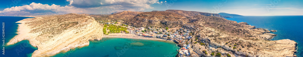 Obraz na płótnie Aerial view of Matala beach on Crete island with azure clear water, Greece, Europe w salonie