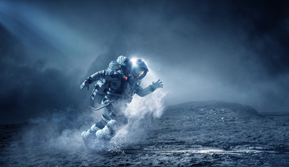 Wall Mural - Spaceman running fast. Mixed media