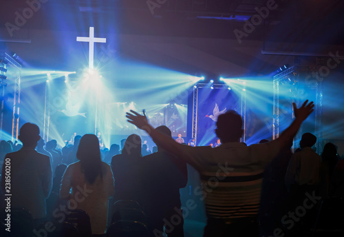 Fotomural Christmas concept: Blurred Christian Congregation Worship God together in Church
