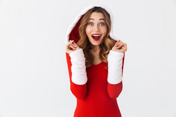 Sticker - Image of festive girl 20s wearing Christmas red dress standing, isolated over white background