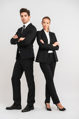 Wall Mural - Full length of confident young business couple