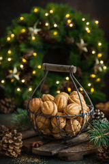 Wall Mural - cookies nuts with caramel filling on festive Christmas background