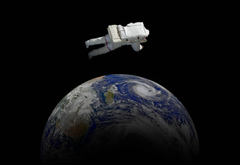 Wall Mural - abstract wallpaper or astronaut flying in outer space near the earth . elements of this image furnis