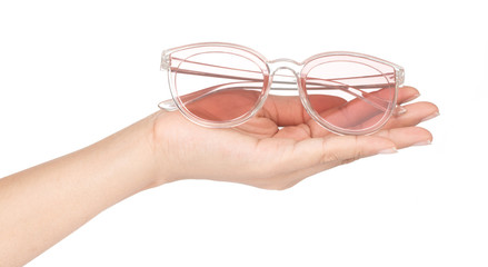 Sticker - hand holding Pink sunglasses on white background