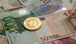 golden bitcoin coin on euro close up