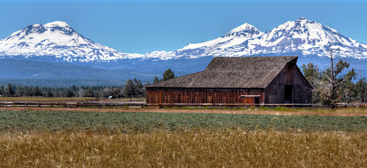 Wall Mural - old barn in front of three sisters