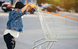 © teksomolika - A little boy and a big cart in the parking lot