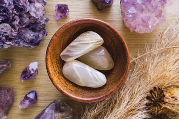 Poster - Teak Bowl of Moonstone with Amethyst Crystals and Dried Poppy Flower