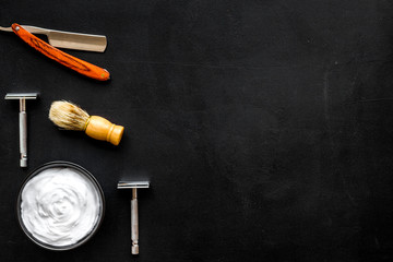 barbershop desk with tools for male care dark background top view mock-up