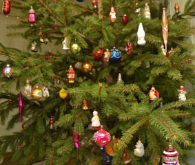 Christams tree with vintage old decoration, toys and balls