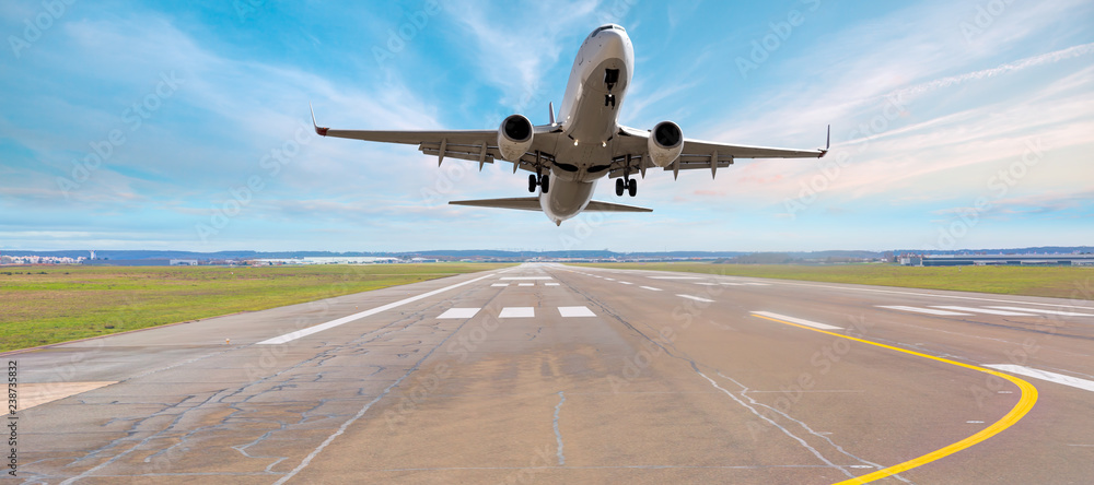 Airplane take off from the airport - Travel by air transport  - obrazy, fototapety, plakaty 