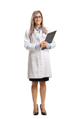 Sticker - Young female doctor holding a clipboard