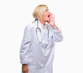 Sticker - Middle age blonde doctor woman over isolated background shouting and screaming loud to side with hand on mouth. Communication concept.