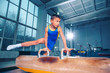 © master1305 - The sportsman performing difficult gymnastic exercise at gym. The sport, exercise, gymnast, health, training, athlete concept. Caucasian fit little boy