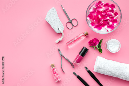 Cuadros en Lienzo manicure and pedicure equipment for nail bar set on rose background top view moc