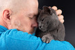 © photosaint - grey cat sitting on a man's shoulder