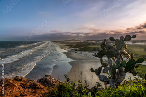 Fotografie, Obraz Sunset in hill of the guardhouse - Torres, Brasil