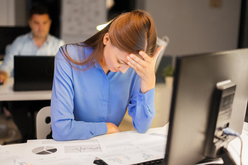 Poster - business, deadline and failure concept - stressed businesswoman with computer working at night office