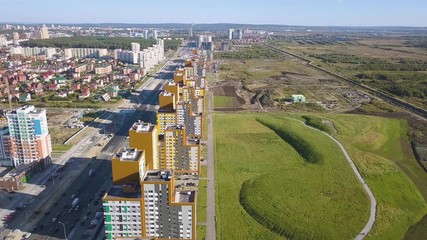 Wall Mural - New buildings in a new area of the city of Yekaterinburg. Construction of houses, parks and roads. Russia, From Drone