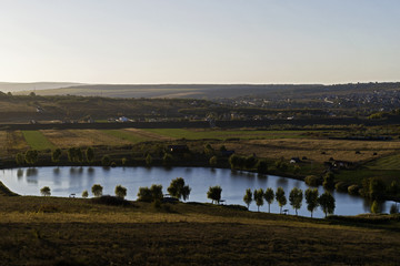 Canvas Print - aerial drone view with lake in fall season