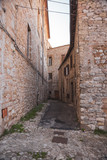 Fototapeta Uliczki - characteristic alley of Italian medieval village. Amelia, Umbria, Italy