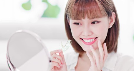 Sticker - woman with retainer for teeth